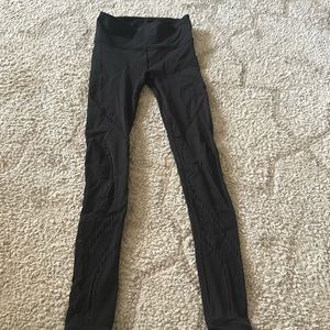 Lululemon legging w fun netting design throughout  great fit great condition.